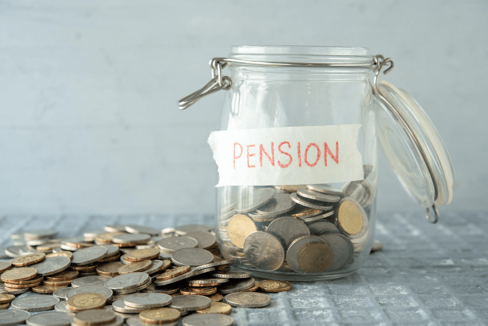 Jar with coins labeled pension.